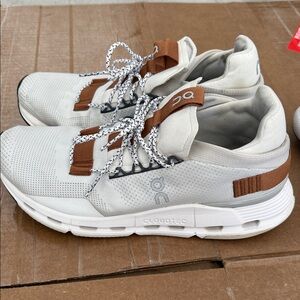 On Running White and Brown Sneakers